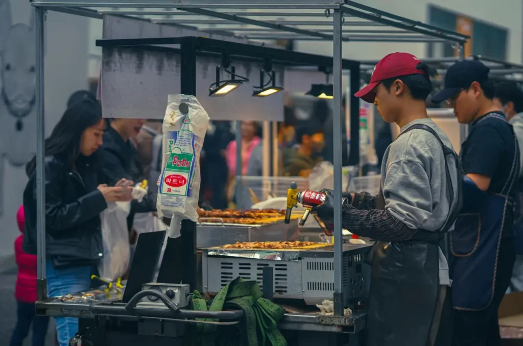 street food cart behind Myeongdong street